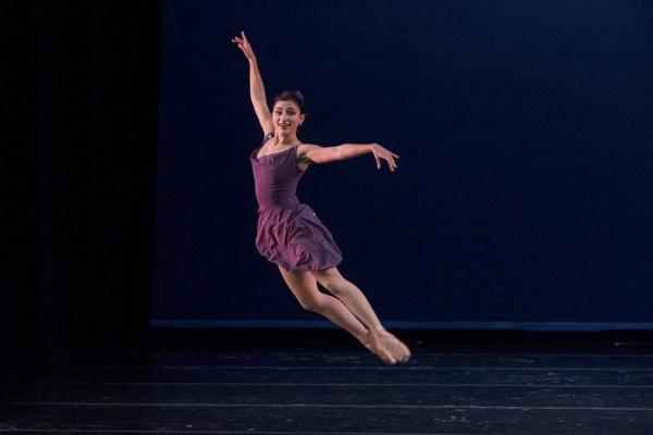 Maia dancing on stage